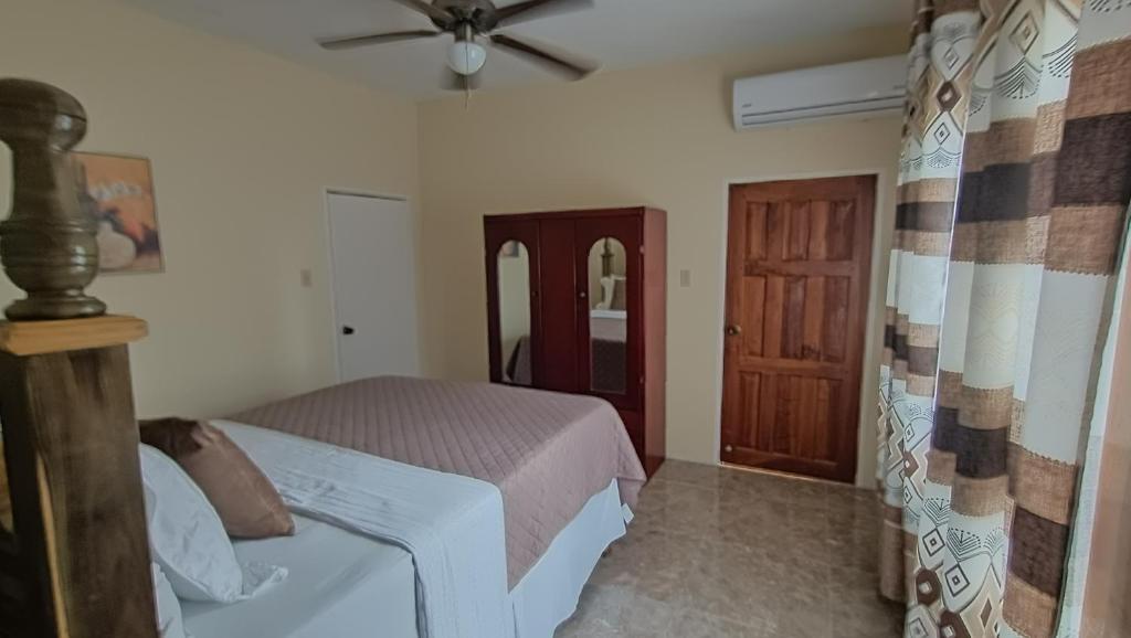 Ένα ή περισσότερα κρεβάτια σε δωμάτιο στο Cosy Getaway