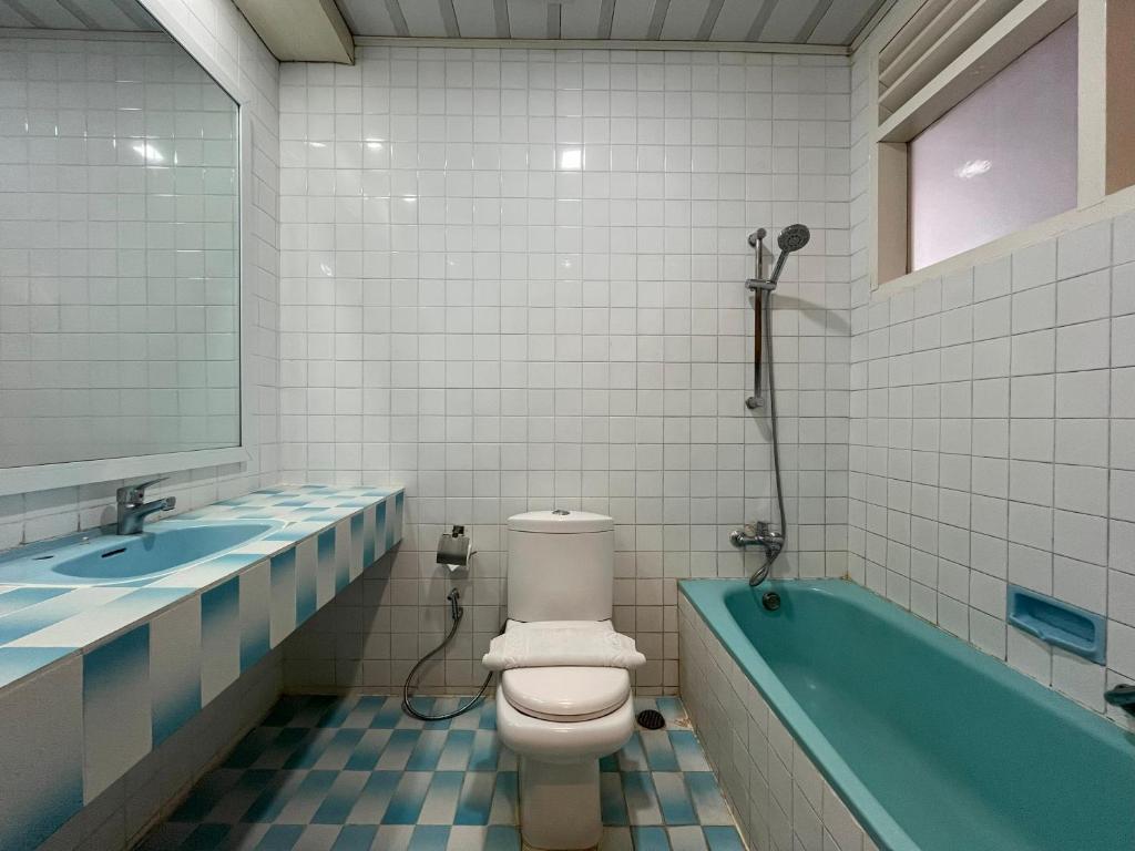 Koupelna v ubytování Grand Tamaro Hotel