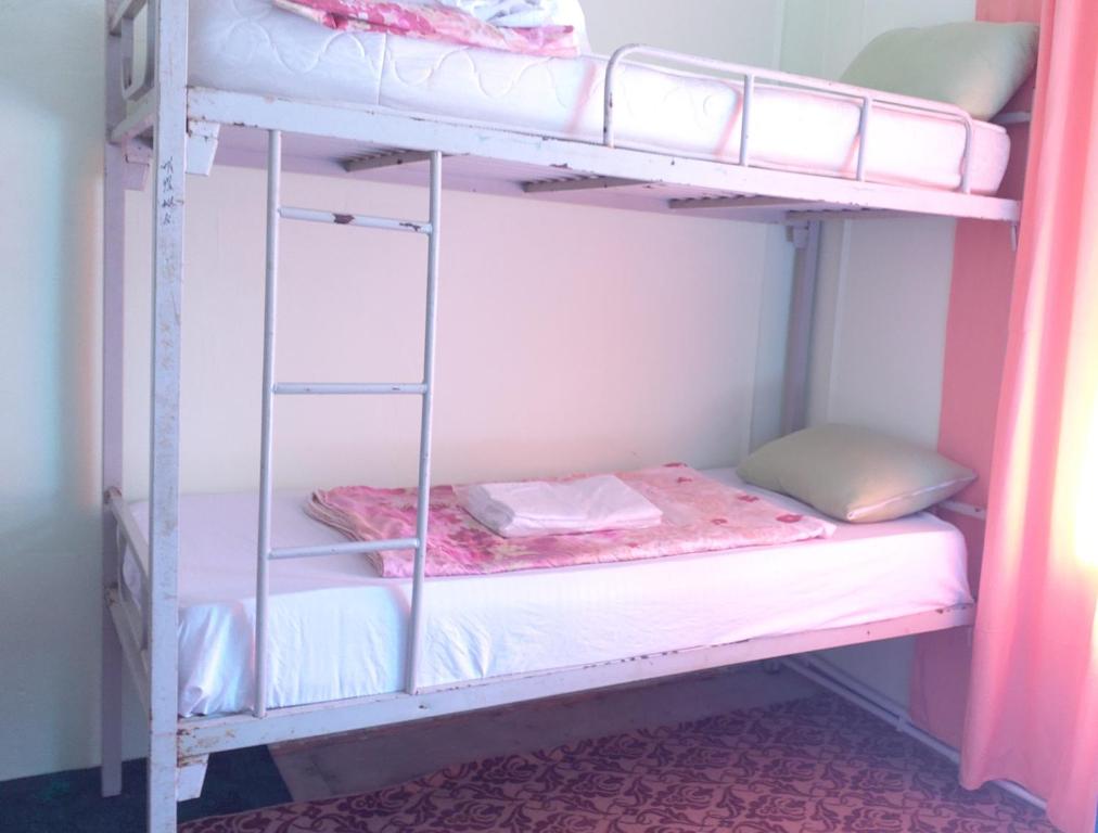 Postel nebo postele na pokoji v ubytování Canal Hostel