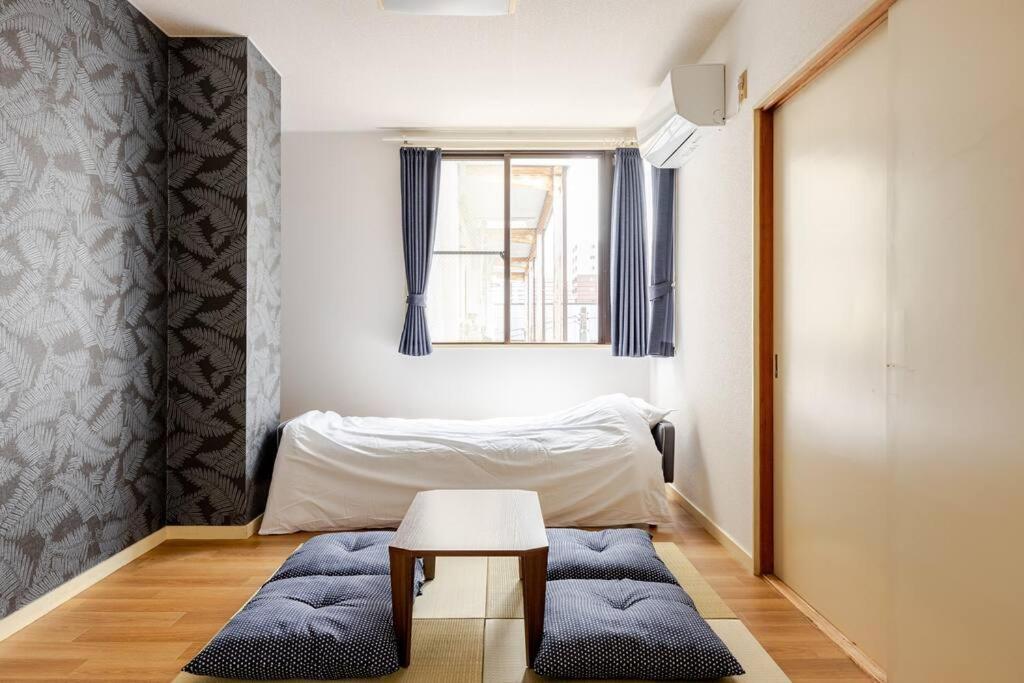 En eller flere senge i et værelse på 立石5丁目m402