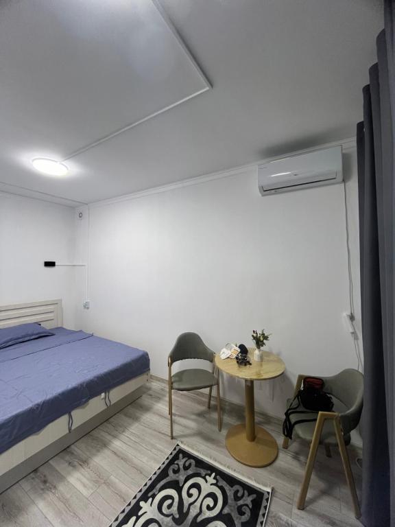 Postel nebo postele na pokoji v ubytování Nomads Home