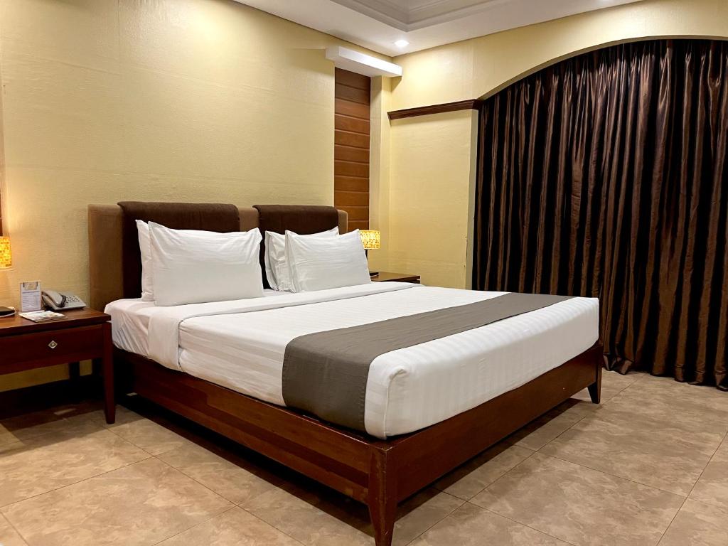 Postel nebo postele na pokoji v ubytování Hotel Del Rio