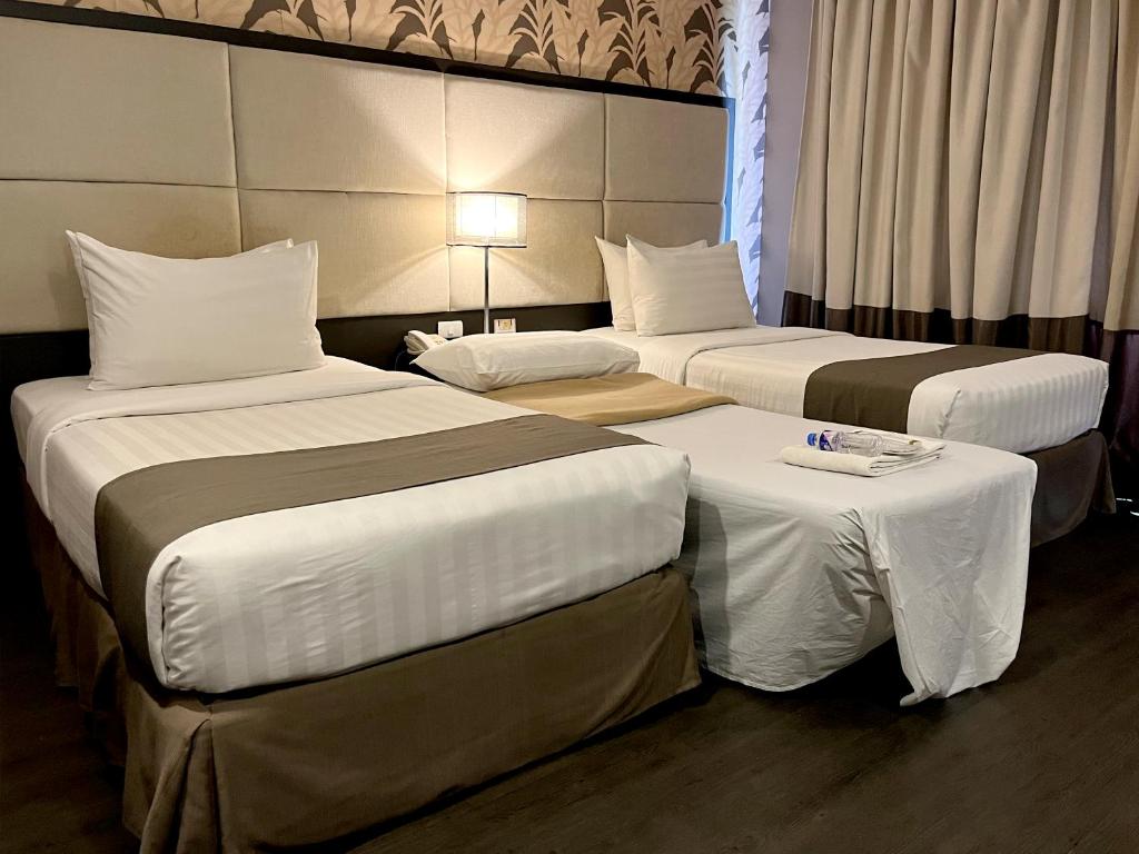 Postel nebo postele na pokoji v ubytování Hotel Del Rio
