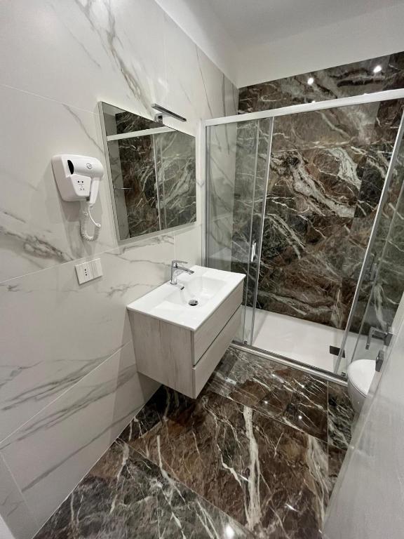 Koupelna v ubytování Hotel Paladini