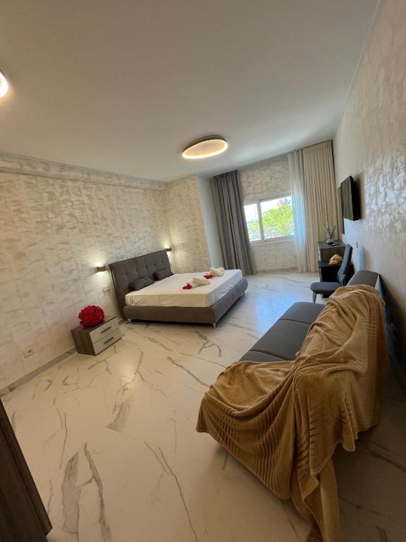 Postel nebo postele na pokoji v ubytování Hotel Paladini