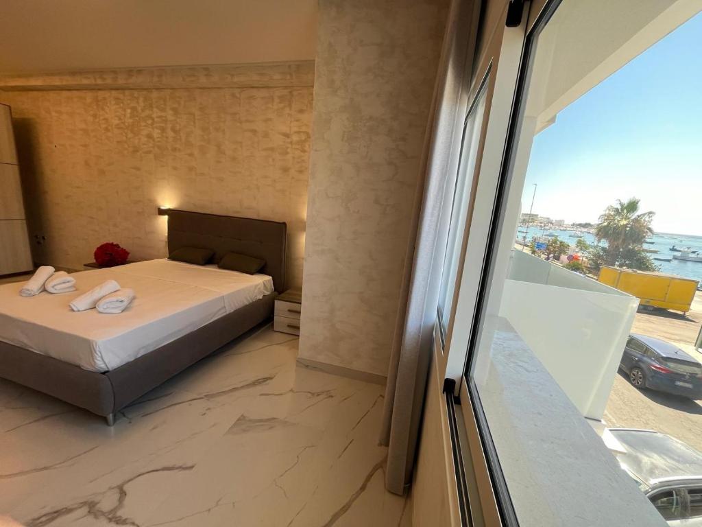 Postel nebo postele na pokoji v ubytování Hotel Paladini