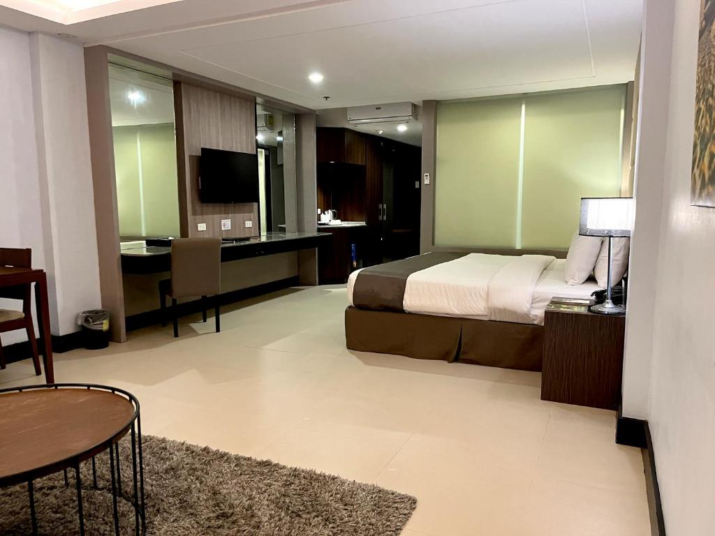 TV a/nebo společenská místnost v ubytování Hotel Del Rio