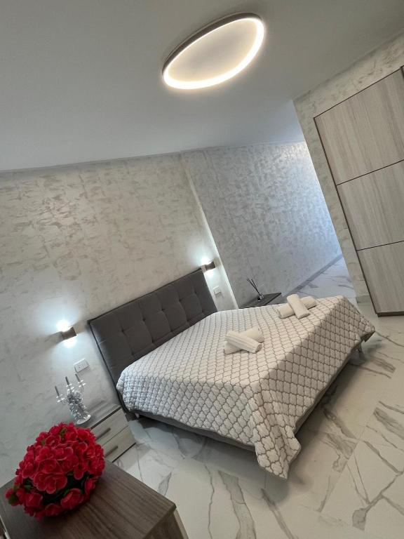Postel nebo postele na pokoji v ubytování Hotel Paladini