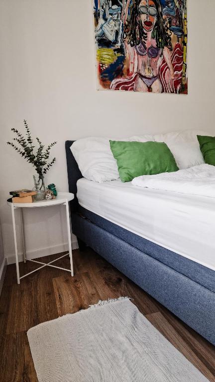 Postel nebo postele na pokoji v ubytování Apartments nahe der Südsteirischen Weinstraße
