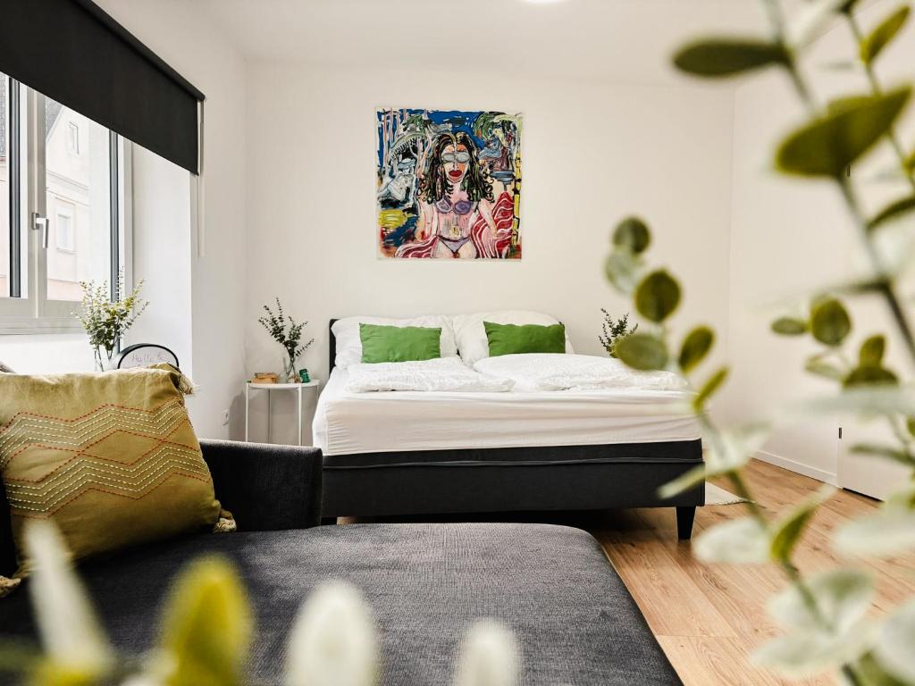 Postel nebo postele na pokoji v ubytování Apartments nahe der Südsteirischen Weinstraße