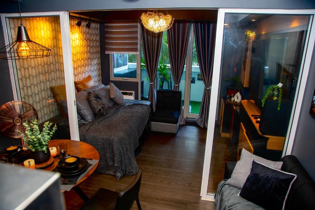 Posezení v ubytování Azure Urban Resort Staycation by Solace Peak 3 1Bedroom with PS4