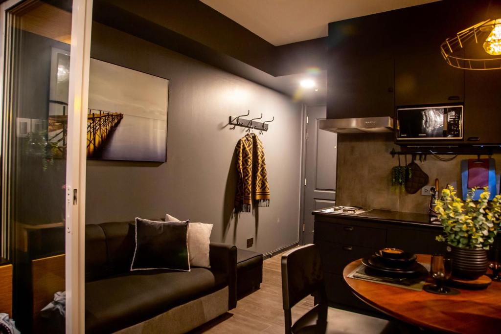 Posezení v ubytování Azure Urban Resort Staycation by Solace Peak 3 1Bedroom with PS4