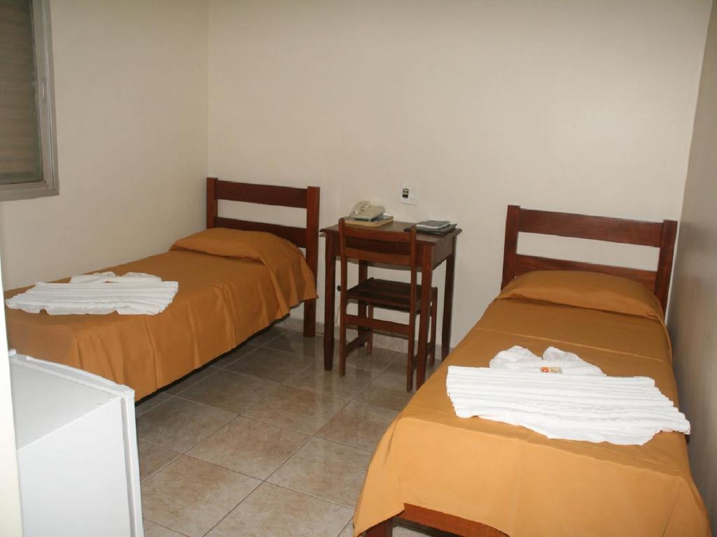 Postel nebo postele na pokoji v ubytování Scala Hotel Barretos