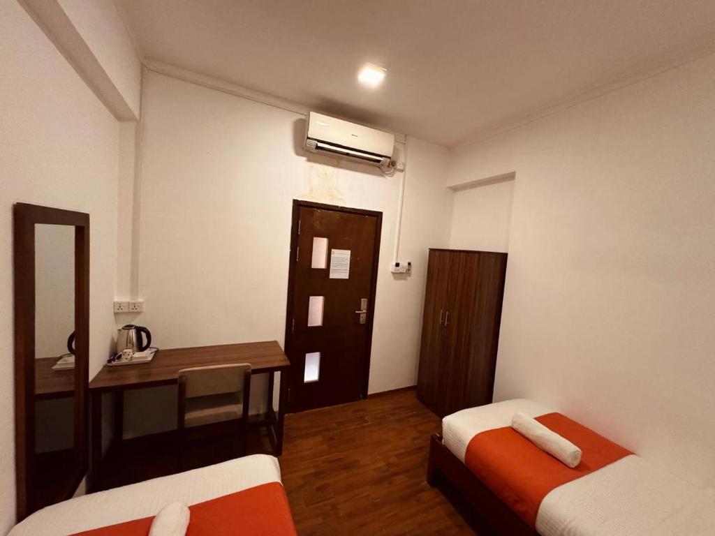 Postel nebo postele na pokoji v ubytování CityRest Fort