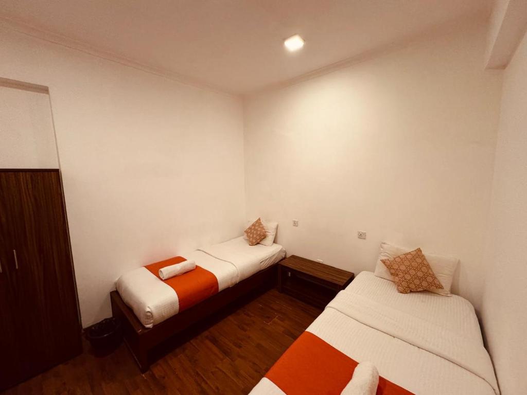 Postel nebo postele na pokoji v ubytování CityRest Fort