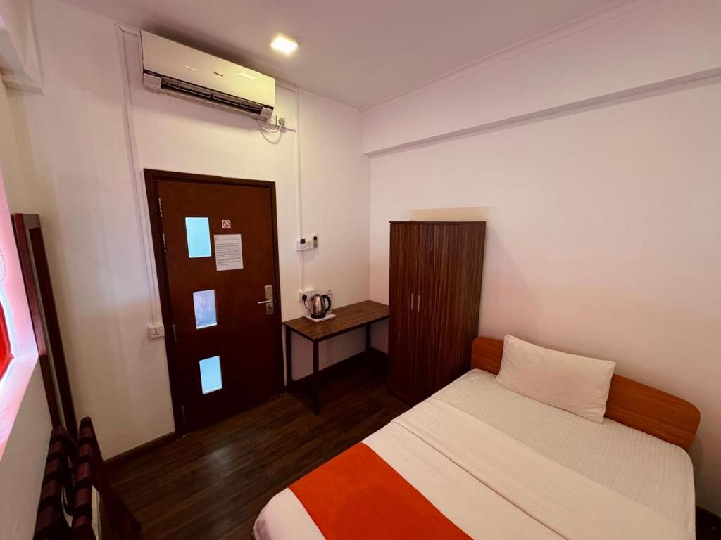 Postel nebo postele na pokoji v ubytování CityRest Fort