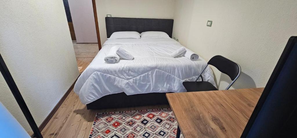 Postel nebo postele na pokoji v ubytování Hotel Sofra