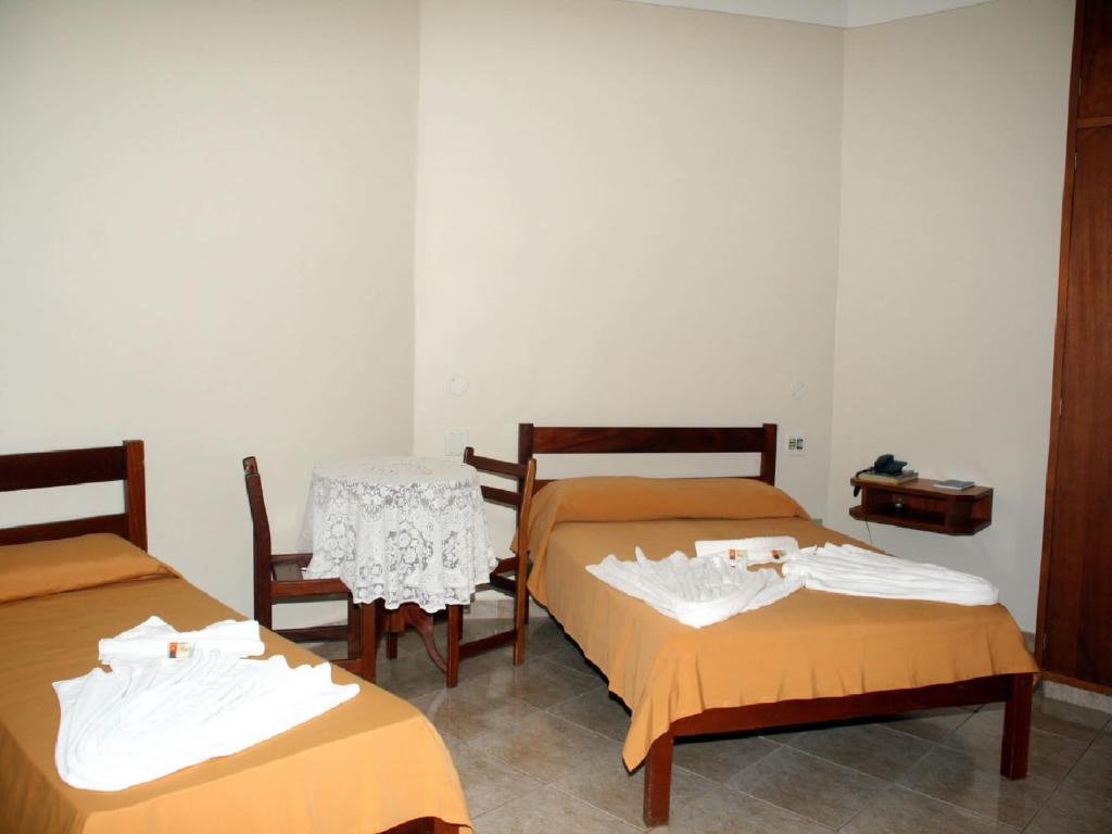 Postel nebo postele na pokoji v ubytování Scala Hotel Barretos