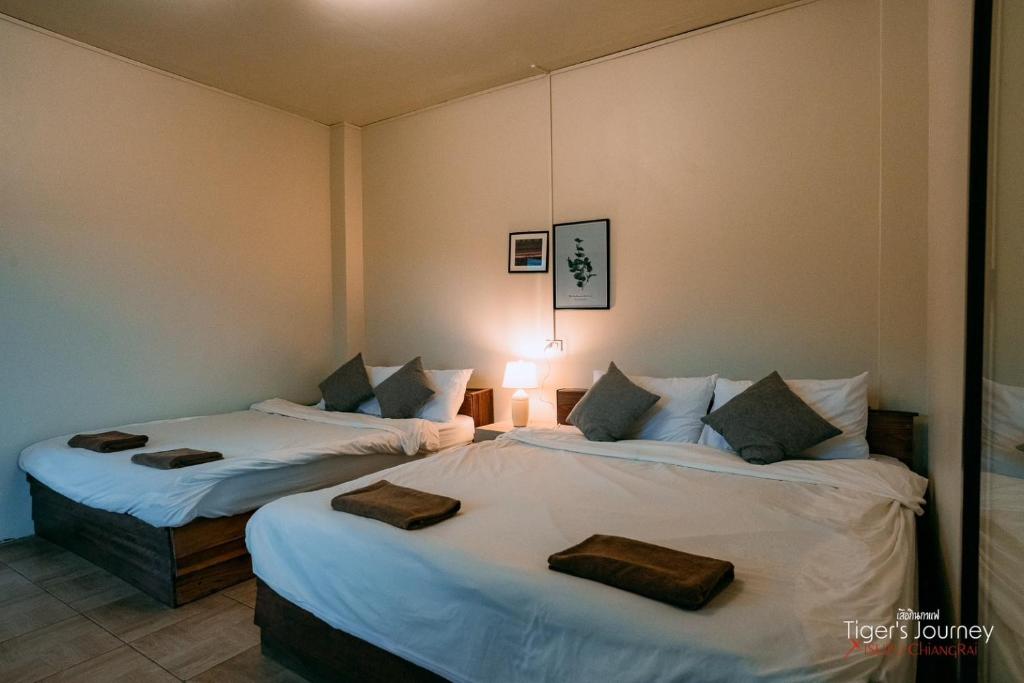 Postel nebo postele na pokoji v ubytování JADAE HOUSE Doichang2