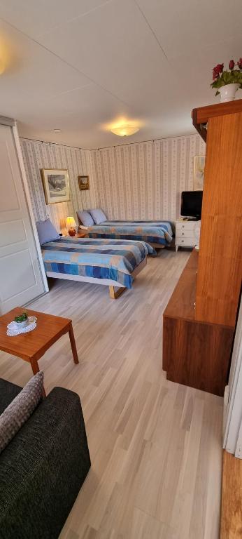 Postel nebo postele na pokoji v ubytování Bo i Trelleborg