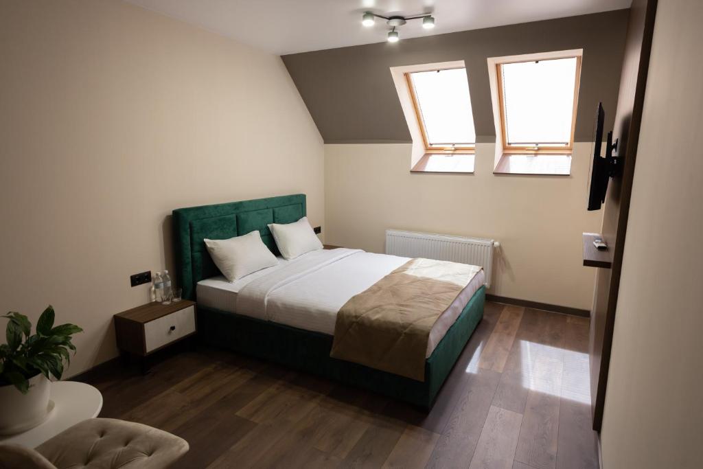 Postel nebo postele na pokoji v ubytování Prime Hotel