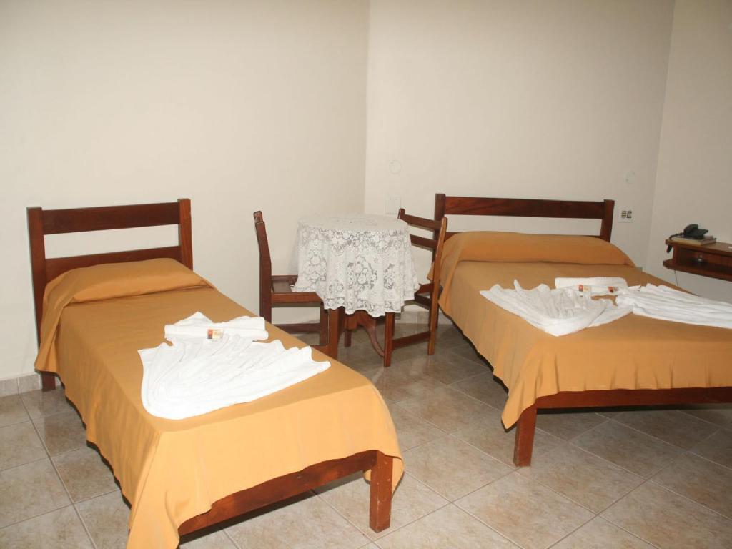 Postel nebo postele na pokoji v ubytování Scala Hotel Barretos