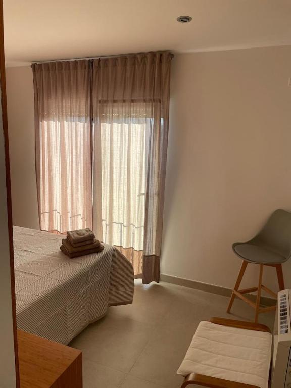 Postel nebo postele na pokoji v ubytování Casa Jose y María