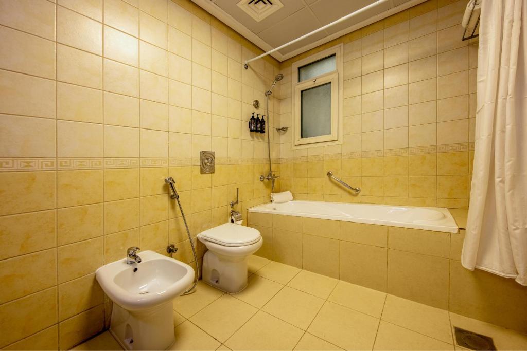 Koupelna v ubytování TIME Ruby Hotel Apartment