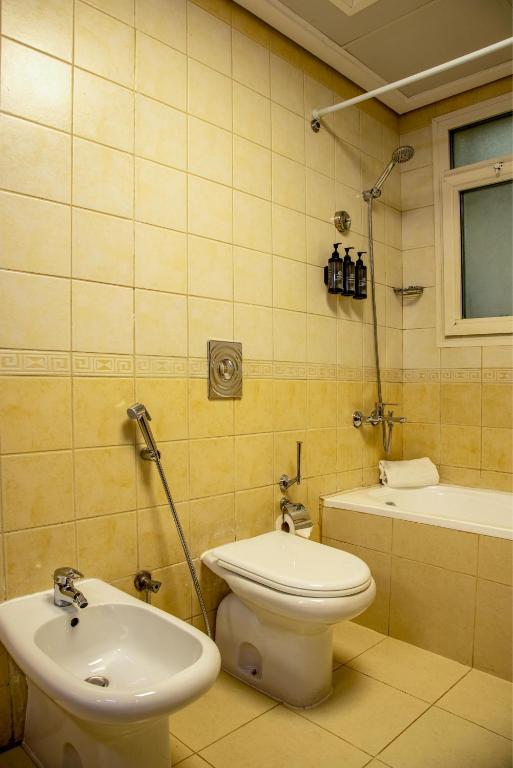 Koupelna v ubytování TIME Ruby Hotel Apartment