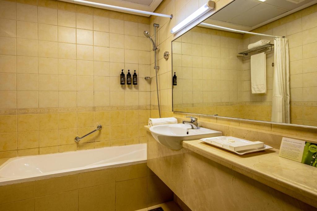 Koupelna v ubytování TIME Ruby Hotel Apartment