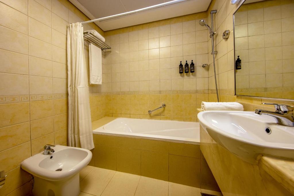 Koupelna v ubytování TIME Ruby Hotel Apartment