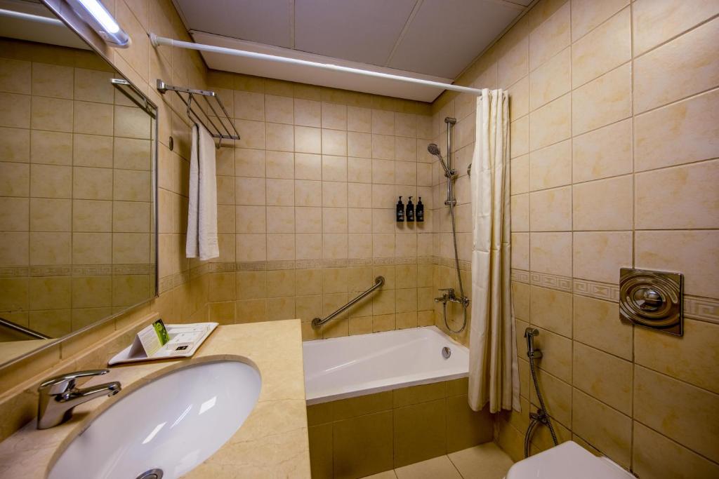 Koupelna v ubytování TIME Ruby Hotel Apartment