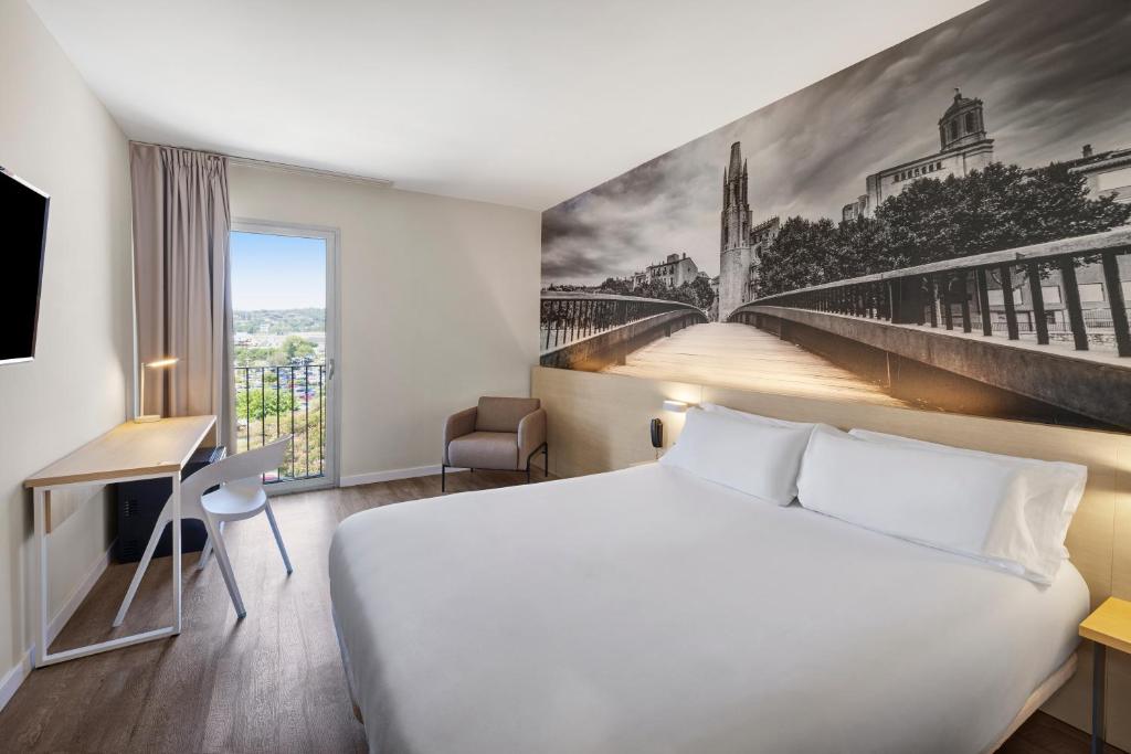 Postel nebo postele na pokoji v ubytování B&B HOTEL Girona 3