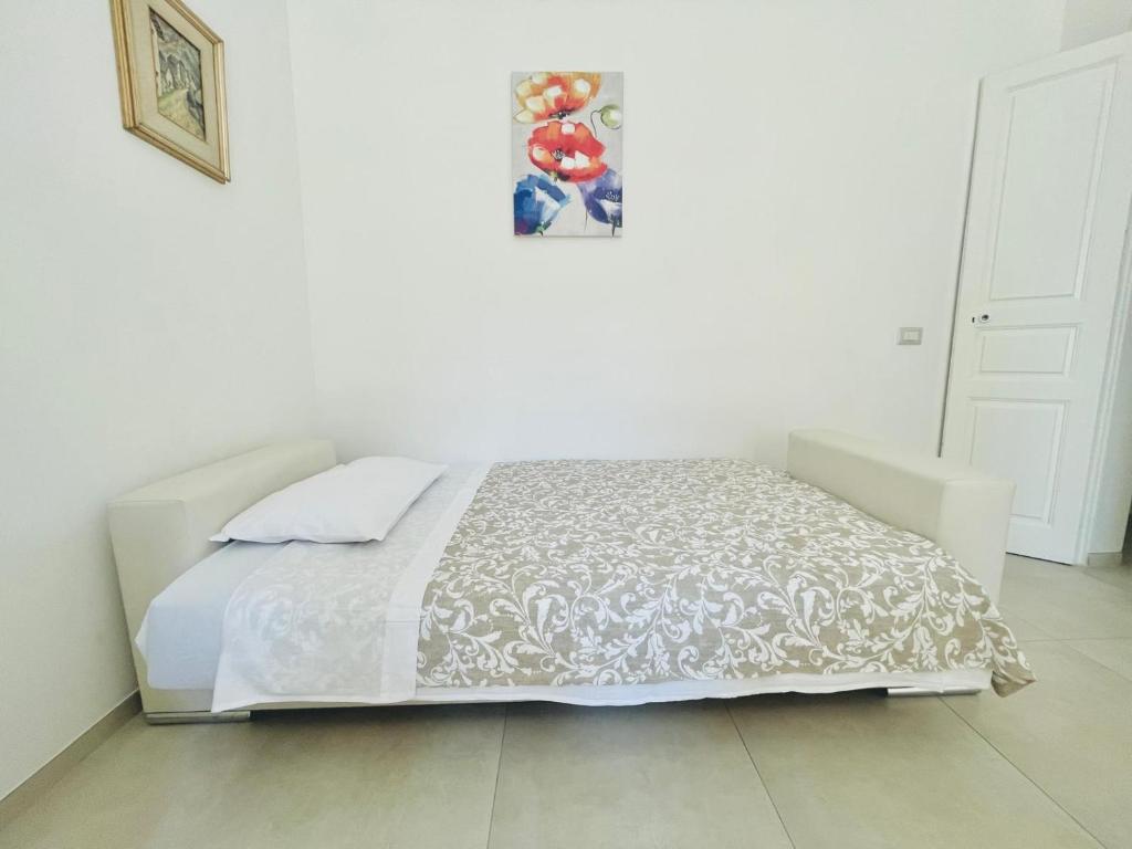 Postel nebo postele na pokoji v ubytování CasaRiso