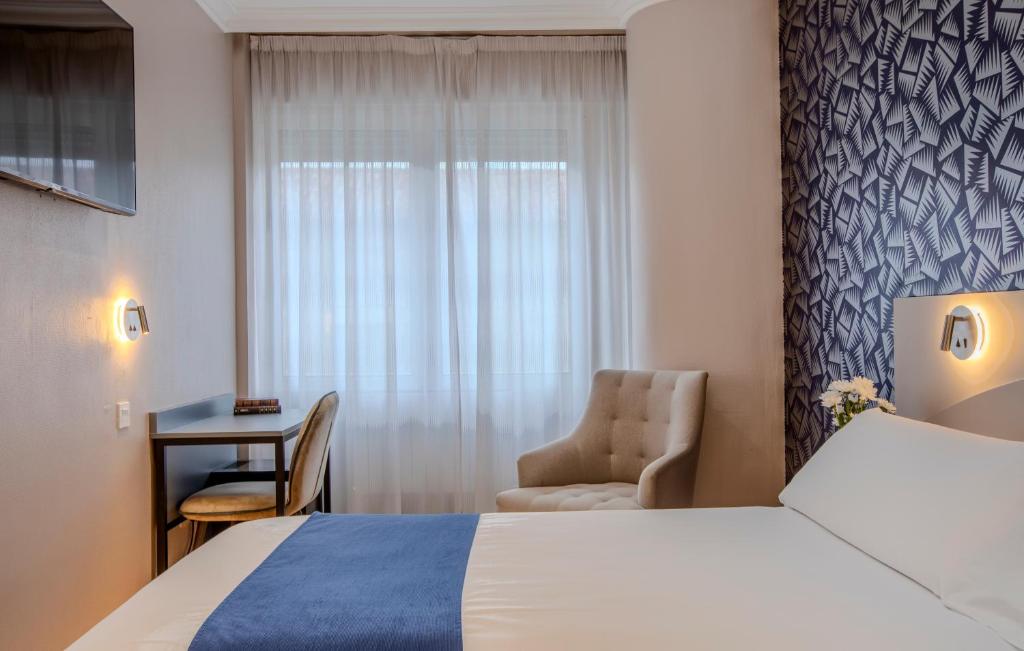 Hotel Corona de Castilla Burgos - Habitación Cuádruple Confort