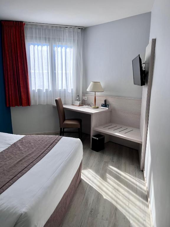 Postel nebo postele na pokoji v ubytování Hôtel-Restaurant de l'Embarcadère