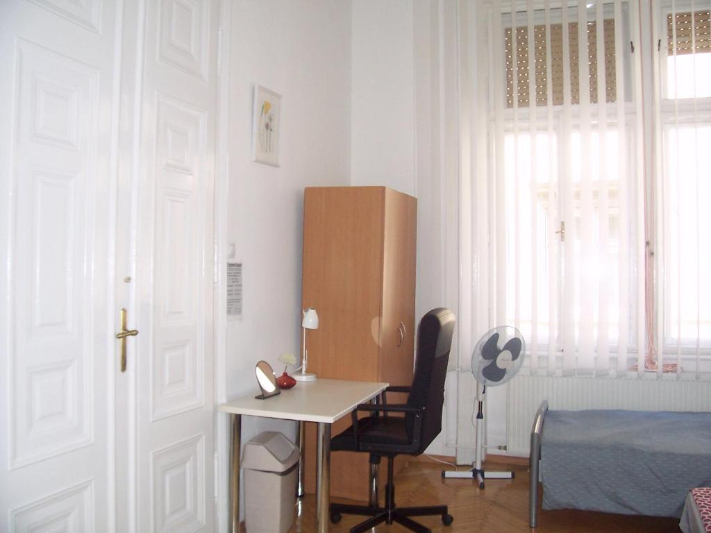 Postel nebo postele na pokoji v ubytování Universal Apartment Budapest