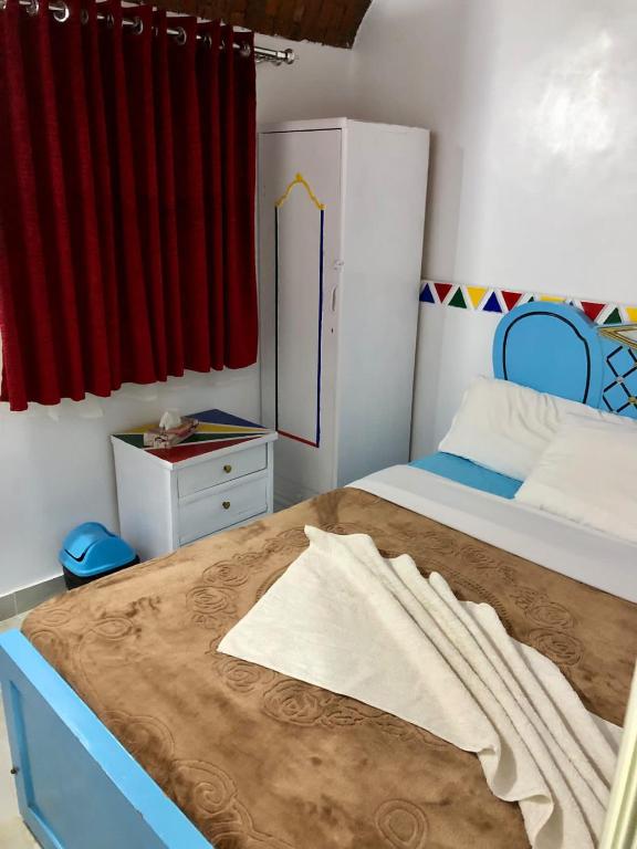 Postel nebo postele na pokoji v ubytování Onaty Ka Guest House