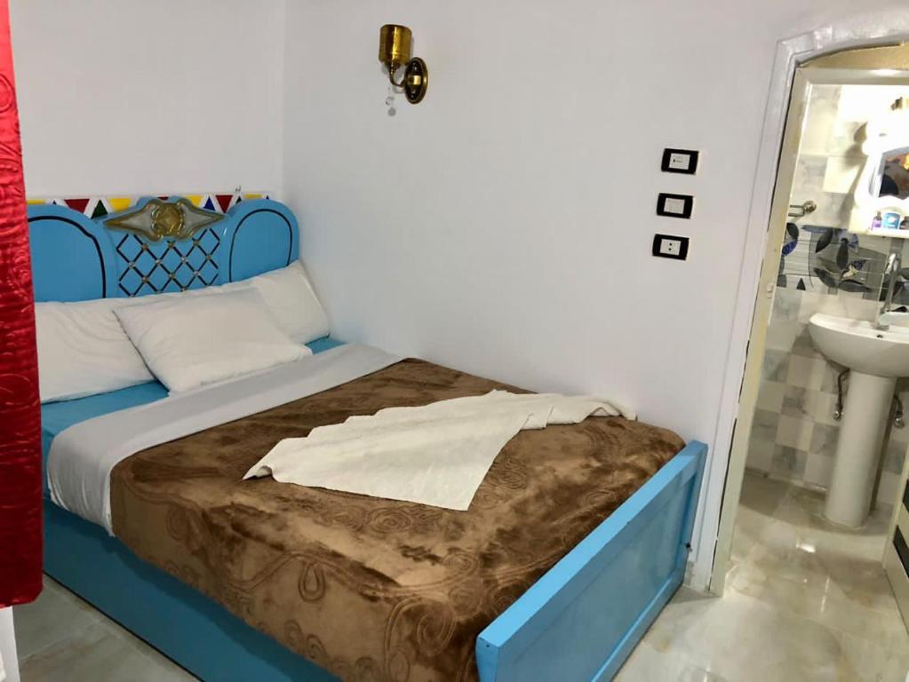 Postel nebo postele na pokoji v ubytování Onaty Ka Guest House