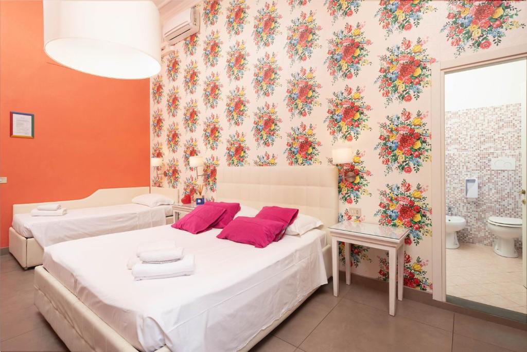 Posteľ alebo postele v izbe v ubytovaní Hotel Jolì