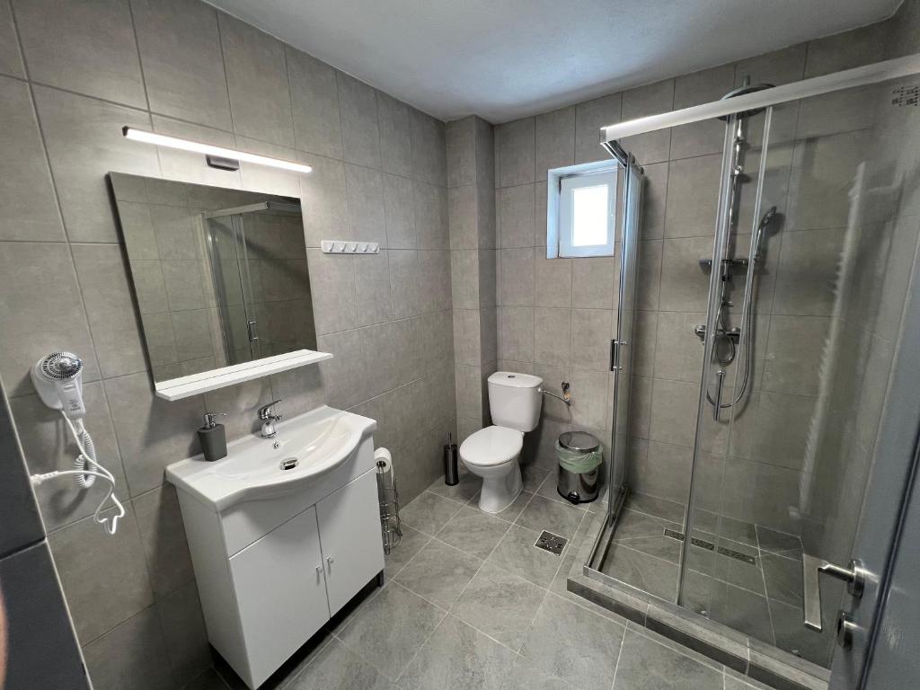 Koupelna v ubytování Salin Home