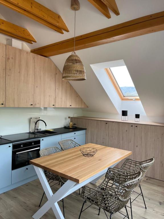 Kuchyň nebo kuchyňský kout v ubytování Apartamenty Nad Jeziorem