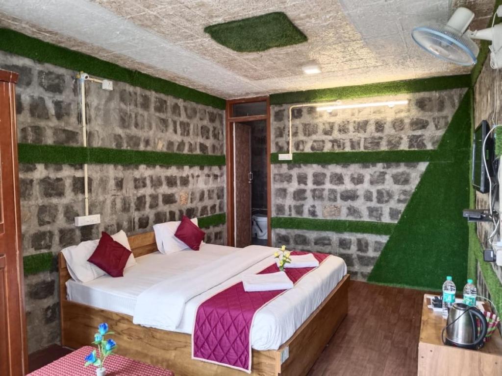 Postel nebo postele na pokoji v ubytování Cholai Resorts & Hotels