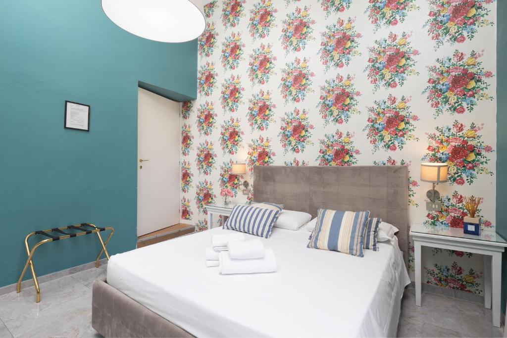 Posteľ alebo postele v izbe v ubytovaní Hotel Jolì