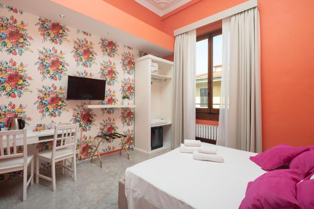 Posteľ alebo postele v izbe v ubytovaní Hotel Jolì