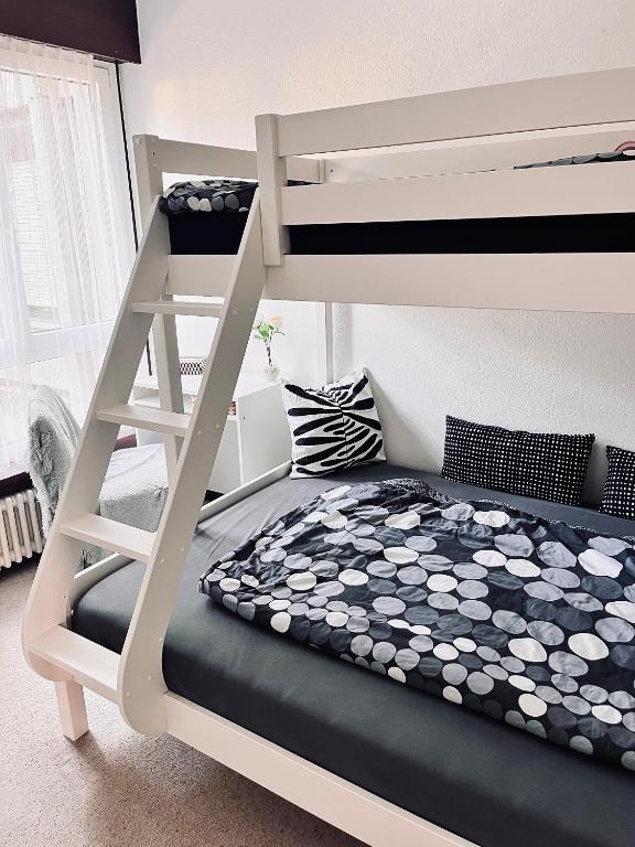 Postel nebo postele na pokoji v ubytování Appartamento Ticino