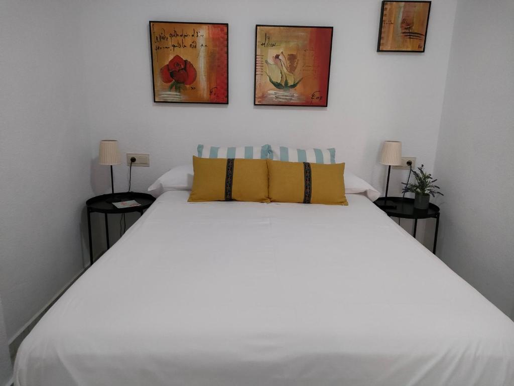 A bed or beds in a room at Pueblo Quinta
