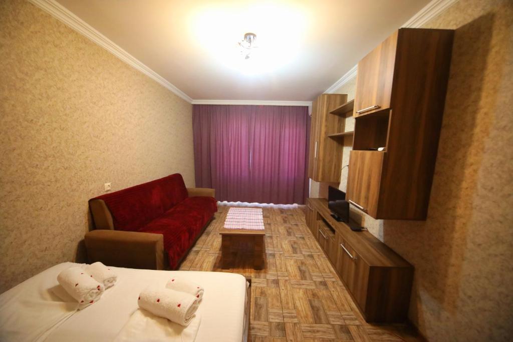 Postel nebo postele na pokoji v ubytování Apartment at station
