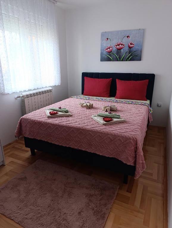 Postel nebo postele na pokoji v ubytování Apartman LARA