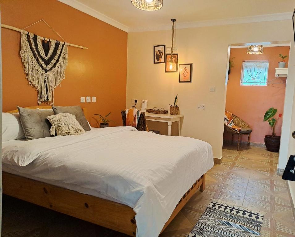 Postel nebo postele na pokoji v ubytování The Yala Home